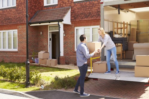 Loading boxes and household items into a removals van in Highbury