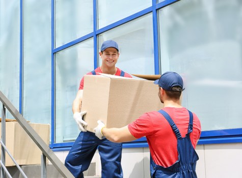 Careful furniture handling inside a Highbury flat during house removals