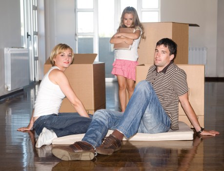 Packed boxes and furniture ready for local removals